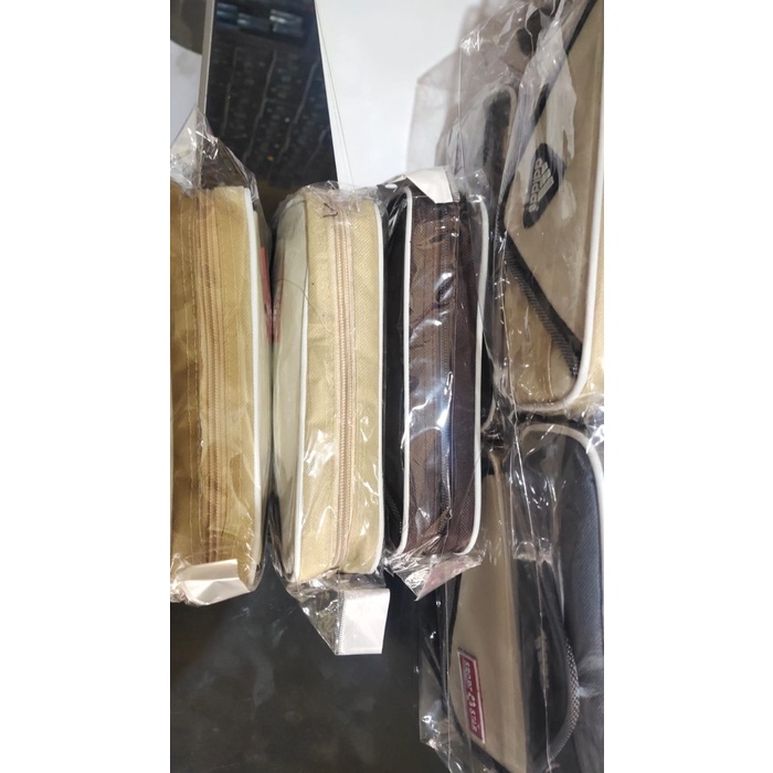

Produk Tempat Pensil Resleting Warna Abu Coklat Krem Bergaransi