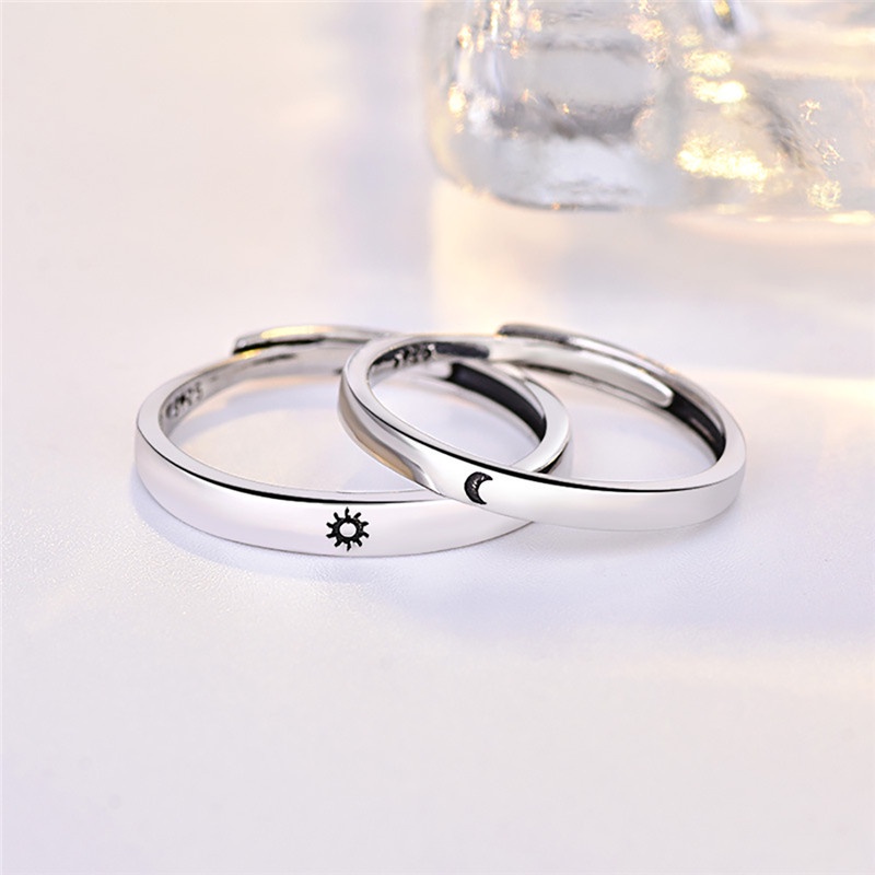 Set Cincin Pasangan Model Terbuka Adjustable Desain Matahari Warna Silver Untuk Hadiah