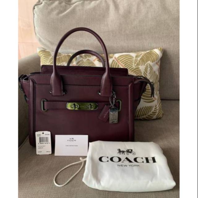 Preloved Coach swagger ori sz 27 oxblood