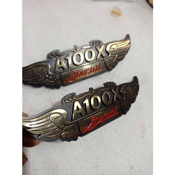 embelem emblem logo tutup aki suzuki a100 a100x econos