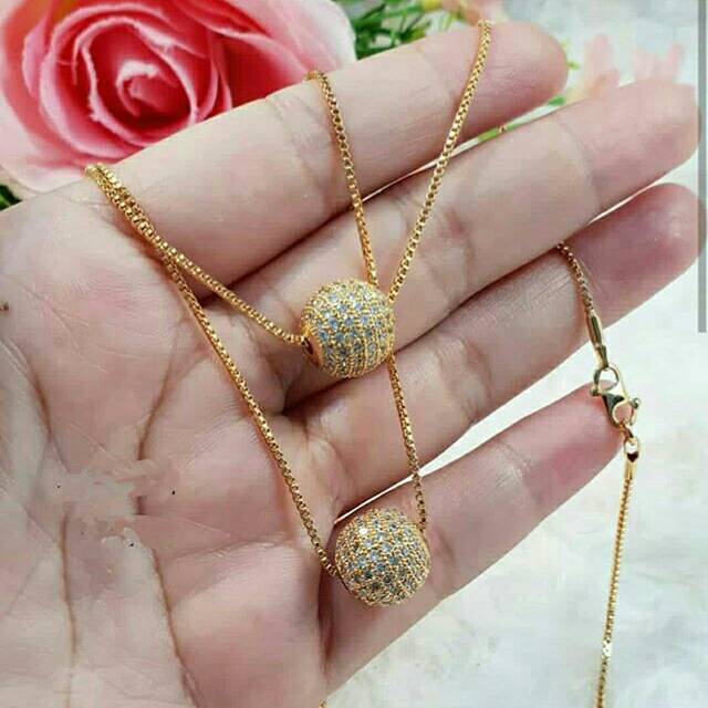 Liontin bulat persis emas asli