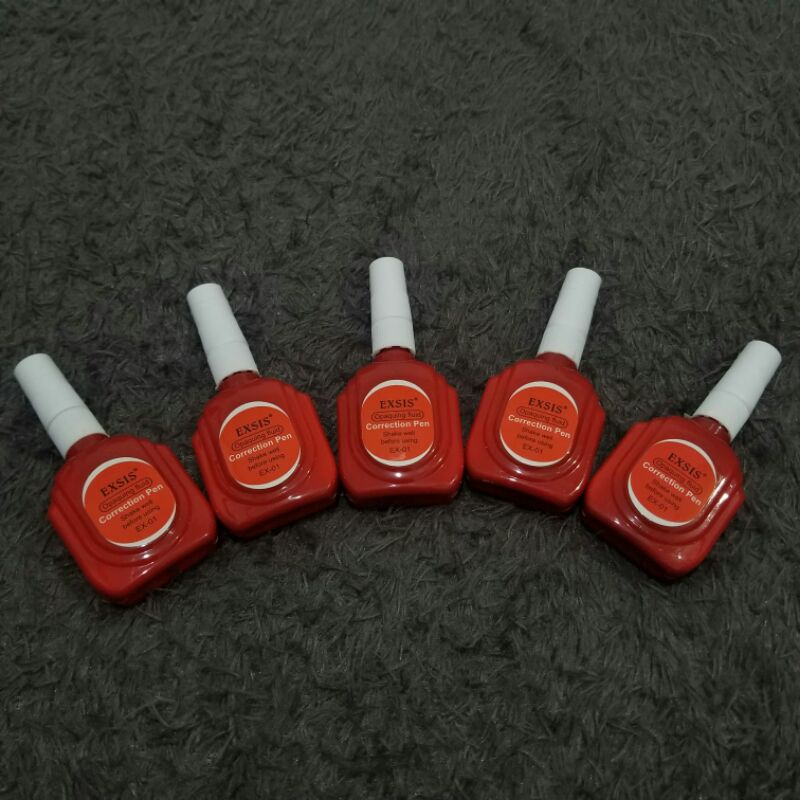 

Tip-Ex cair/tipex/corection pen/stipo/penghapus merek exsis