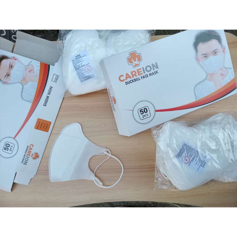 DUCKBILL CAREION PUTIH 1 BOX ISI 50 PCS/LEMBAR