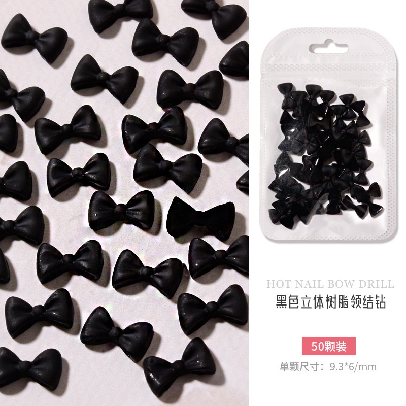 50pcs / Kantong Pita 3D Bahan Resin Warna Hitam Putih Untuk Nail Art