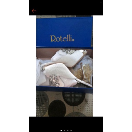 Rotelli sepatu heels preloved sekali pakai