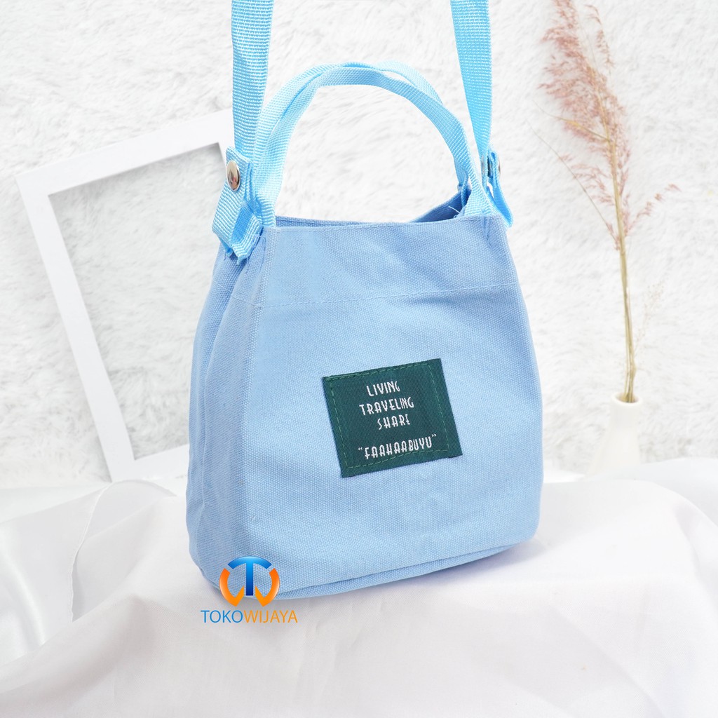 Tas Slempang Living Travel Import | Tote Bag