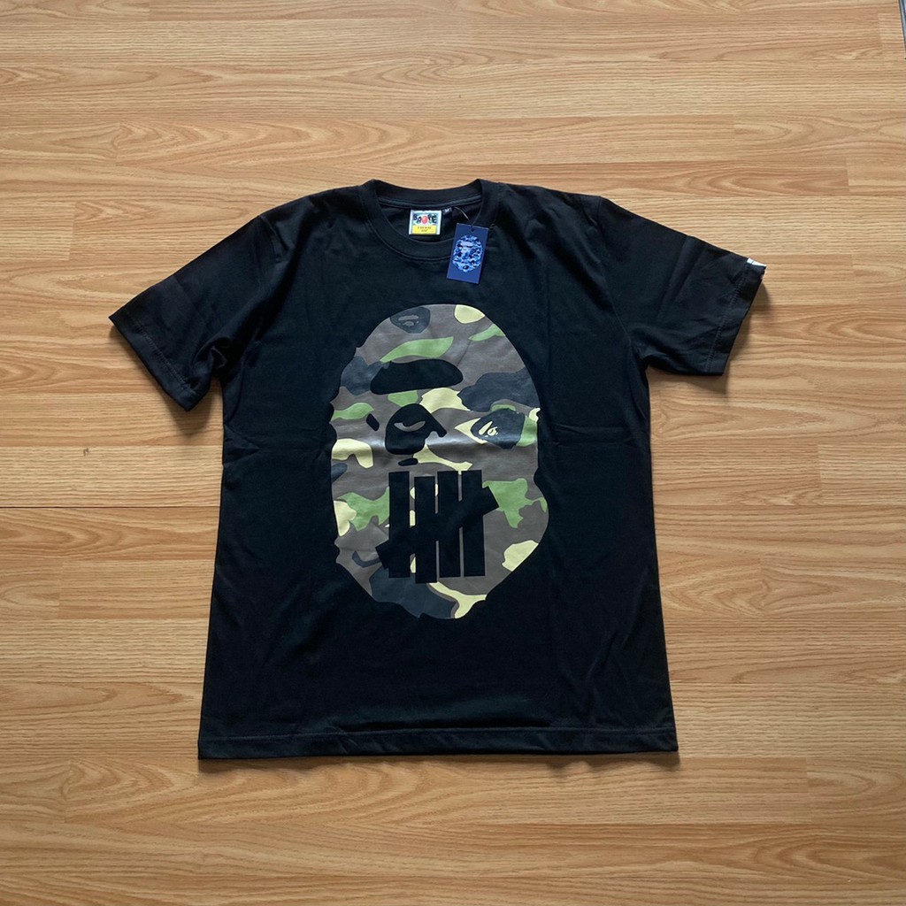 KAOS / TSHIRT / BAJU BAPE A BATHING APE x UNDEFEATED CAMMO PREMIUM