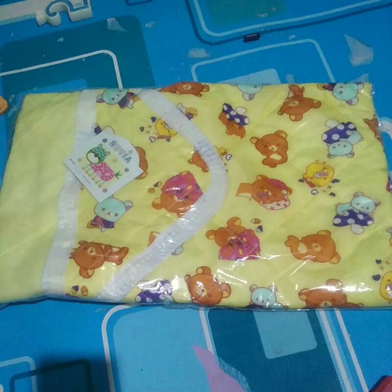 gendongan dan selimut bayi