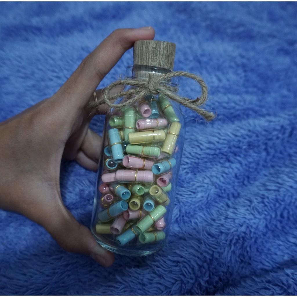 

KADO UNIK SURAT KAPSUL + BOTOL 100ML