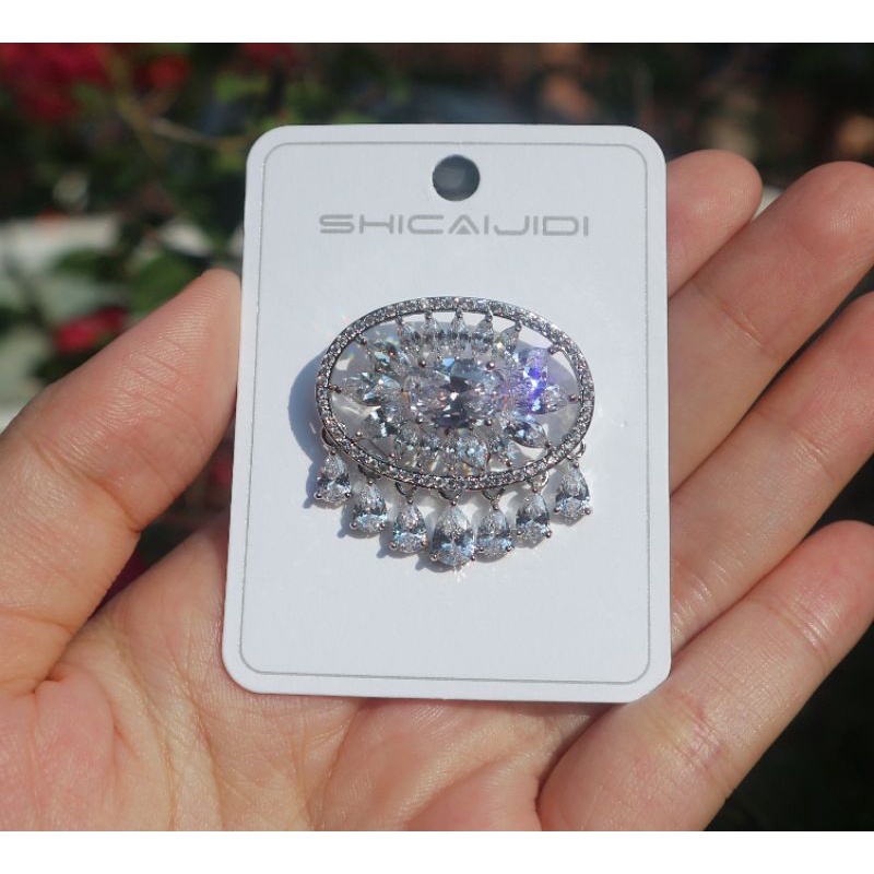 zircon brooch