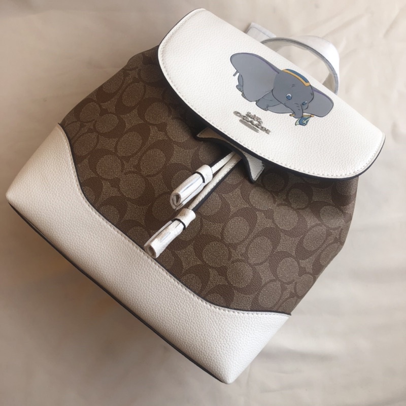 Disney X Coach Elle Backpack In Signature Canvas With Dumbo (91121)