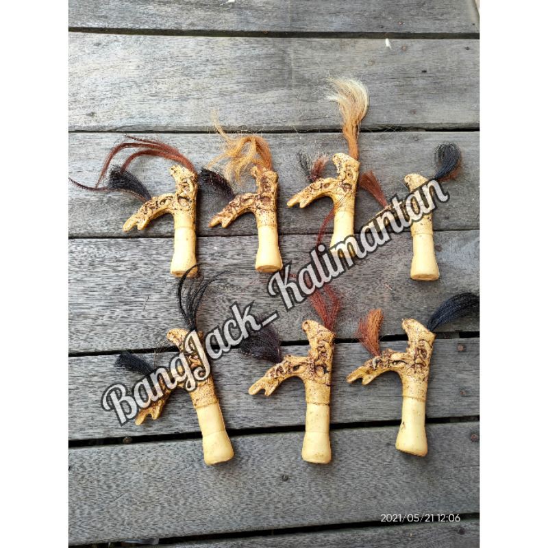 gagang mandau hulu mandau fiber motif tanduk khas kalimantan