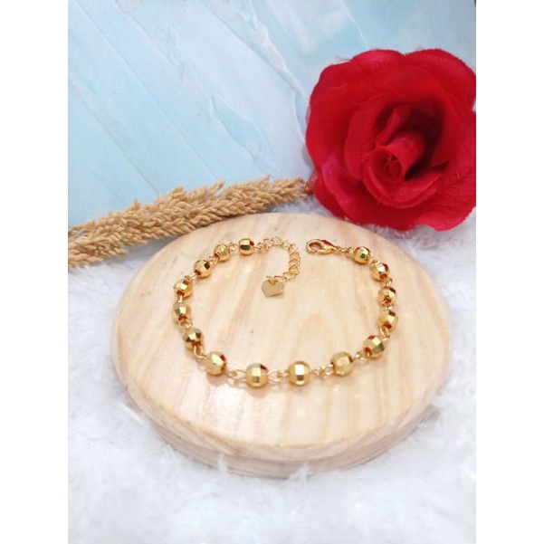 gelang xuping bola motif kaca