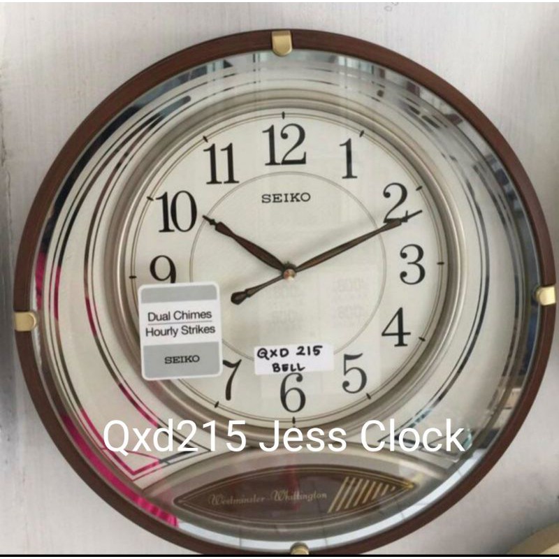 Qxd215 jam dinding seiko bulat Melody.