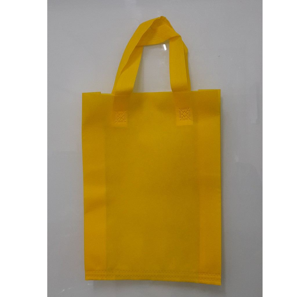 

Tas Press Spunbound Tali Goodie Bag Tas Belanja Warna Kuning 30 cm x 40 cm