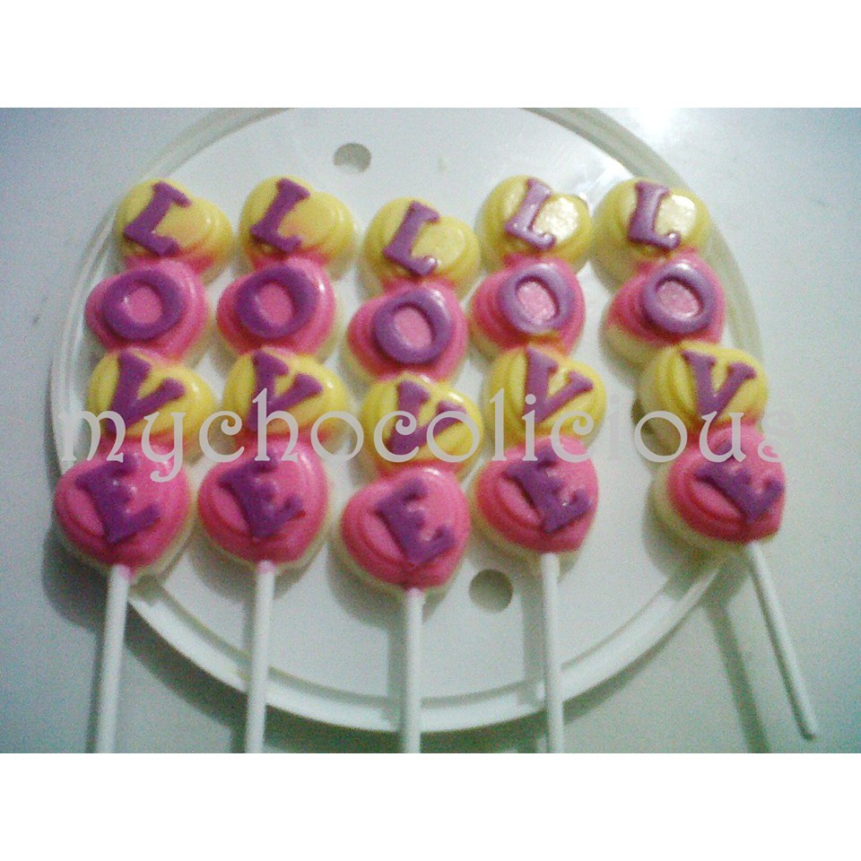 

cokelat praline motif love stick/lolipop