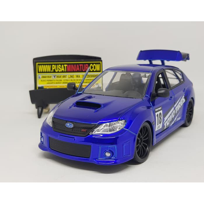 2012 SUBARU WRX STi BIRU- WIDEBODY - SKALA 24 - JADA (DIECAST)