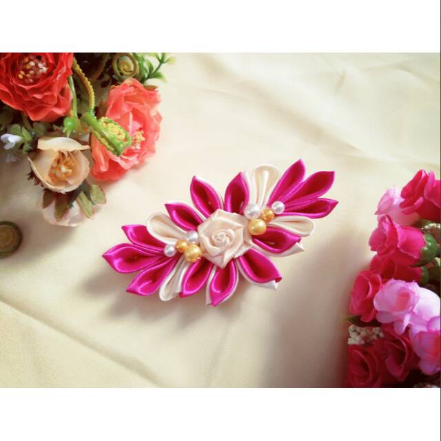 

Headpiece Bunga Pita kanzahi Pink