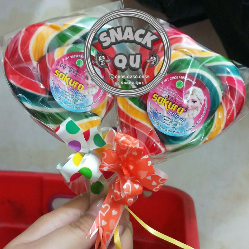 

PERMEN LOLLIPOP HATI 7cm x 7.5cm 60gr / LOLIPOP SEDANG / LOLIPOP MEDIUM