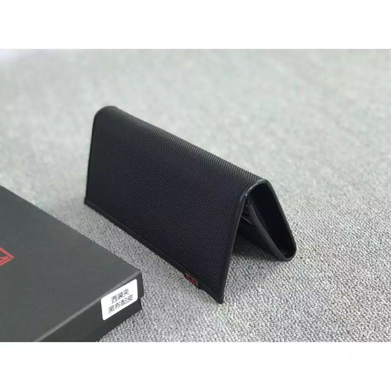 dompet tumi