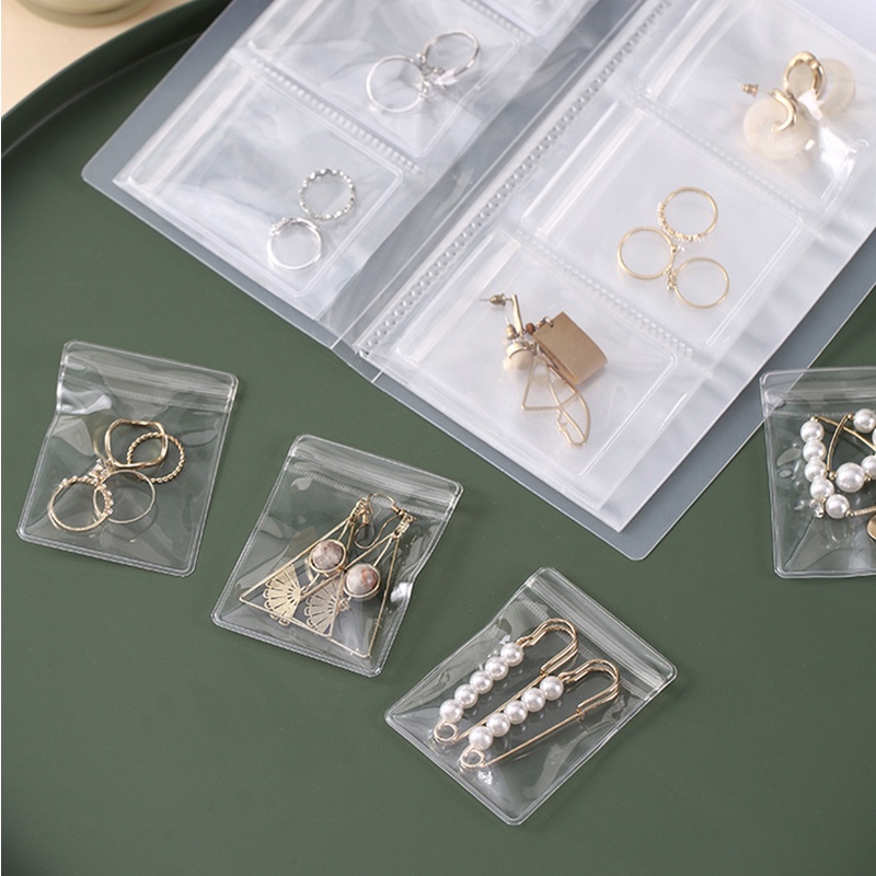 1 / 50 Pcs Tas Penyimpanan Perhiasan Cincin Kalung Anting Gelang Model Transparan Tahan Debu Anti Oksidan