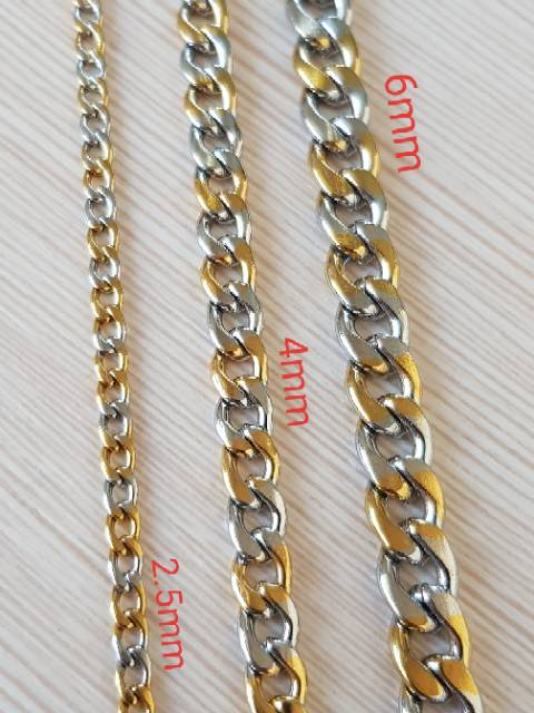 Kalung kombinasi titanium gold &amp; Silver Import Antikarat KGK01