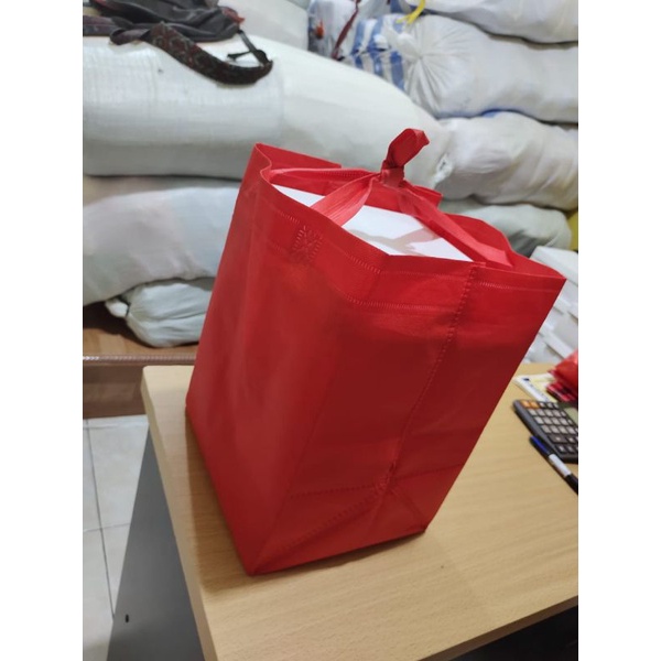 

tas spond lusinan ukuran 20x20 untuk nasi box