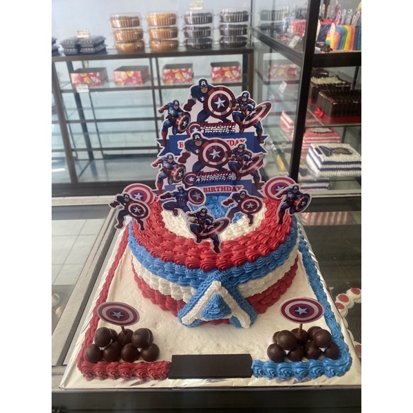 

KUE TART LAPIS SURABAYA HIASAN TOPPER CAPTAIN AMERICA UKURAN 20 CM