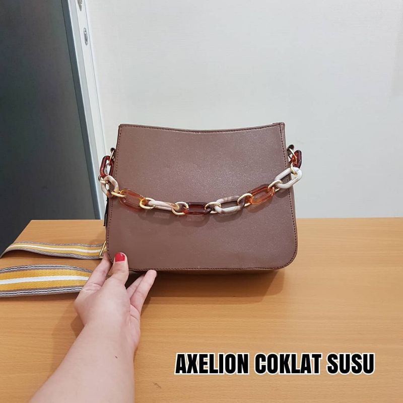 TAS SELEMPANG EXELION COKLAT SUSU, PURPLE dan BLACK