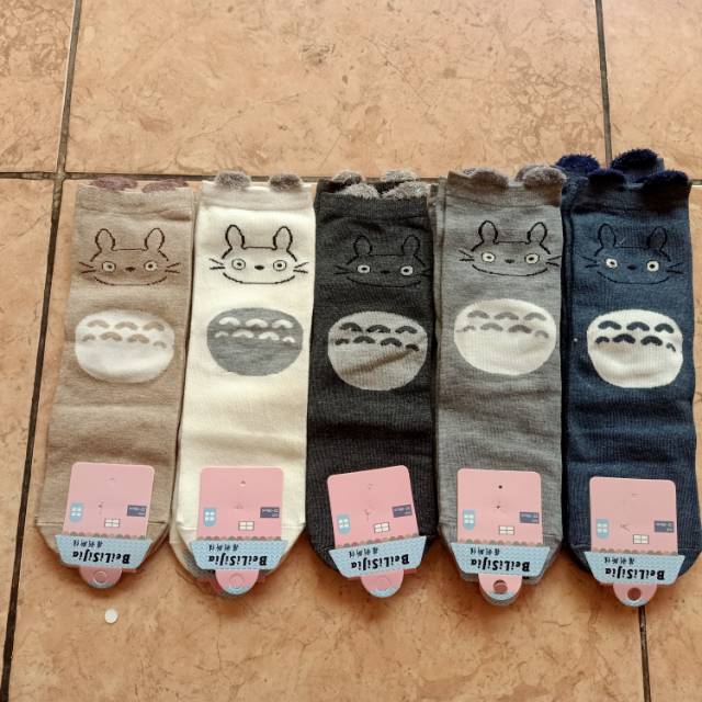 Kaos kaki momotaro lucu