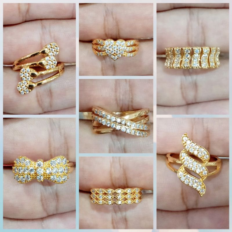 Cincin xuping wanita berlapis emas dengan mata zircon.