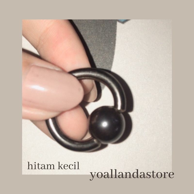 Bandulan piercing (mainan/pemberat piercing)