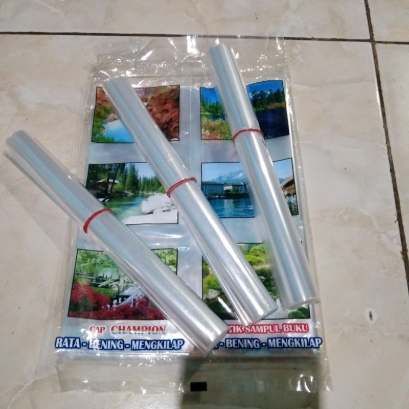 

Sampul buku tulis plastik ukuran Q /gulung isi 10 lembar