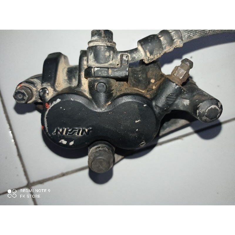 kaliper depan tiger revo