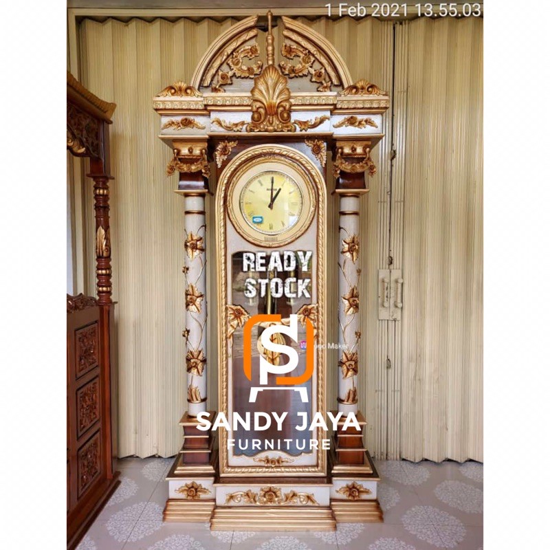 almari jam hias brawijaya ukir mewah jati