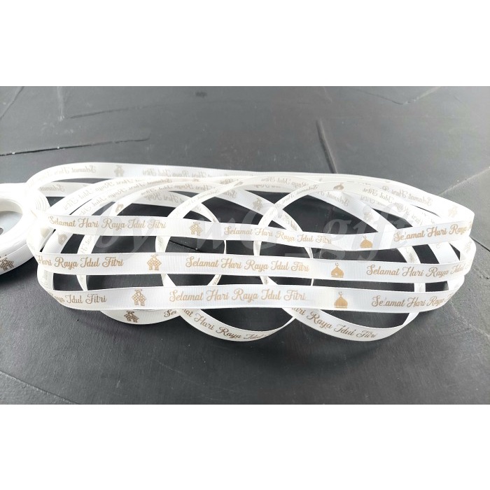 

Pita Idul Fitri-Gross Grain-Broken White;Motif A Lebar 1.2cm; 20 yard