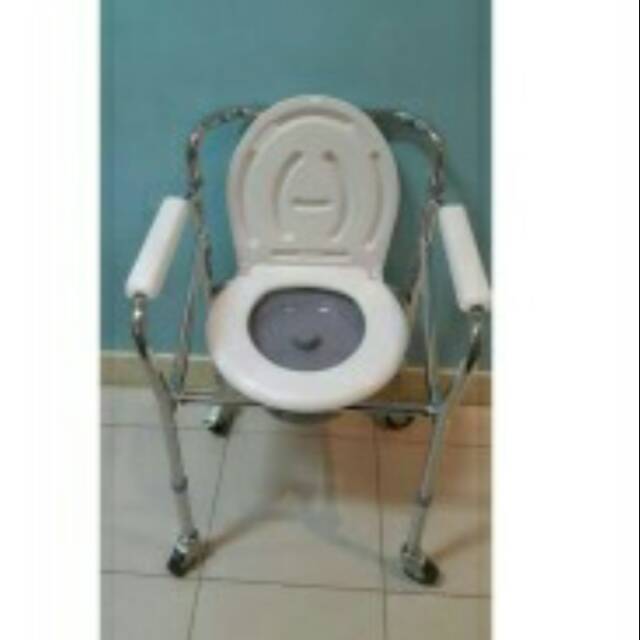 Commade chair/kursi BAB dengan roda /pispot duduk lansia