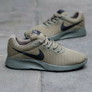 olive green nike tanjun
