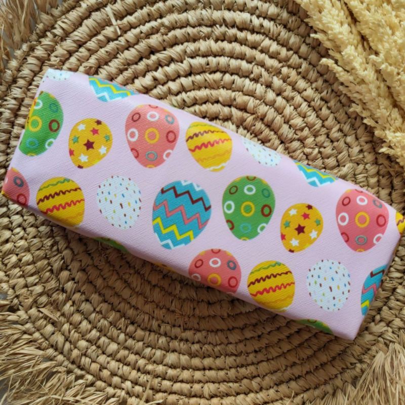 

Tepak pensil motif telur