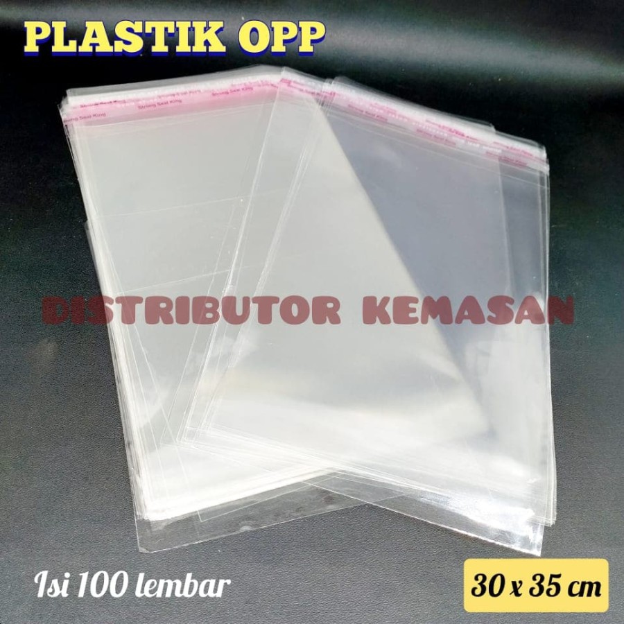 

KEMASAN PLASTIK OPP SEAL LEM PEREKAT KEMASAN BAJU SOUVENIR 30×35 CM