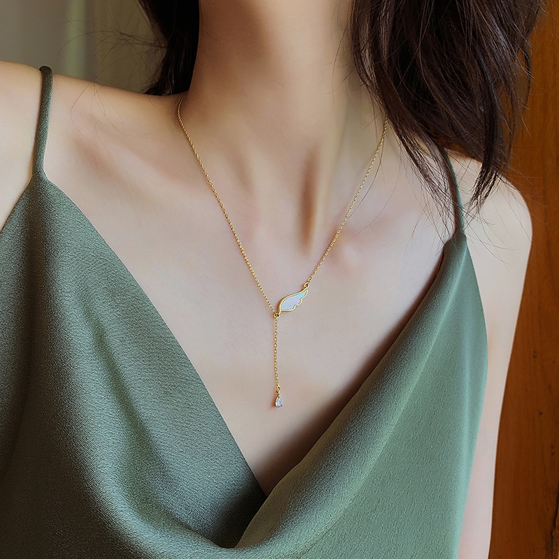 Kalung sayap juntai titanium anti karat korea style terbaru - ercassia