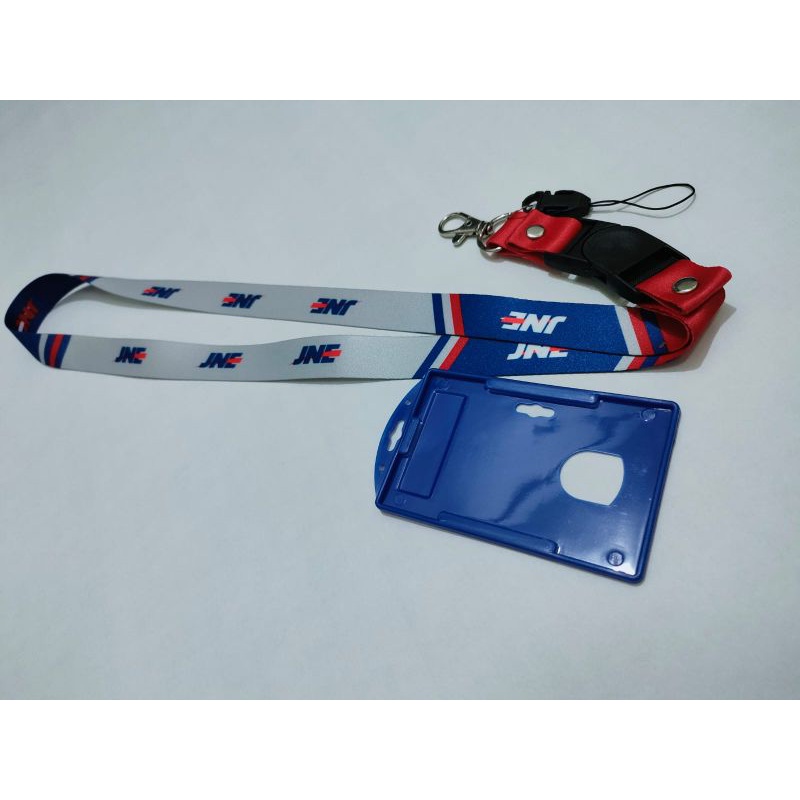 

Tali id card jne merah biru +kesing