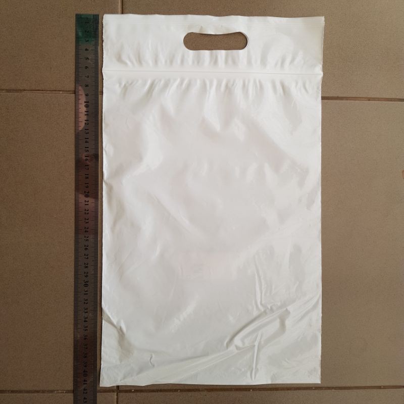 PLASTIK KLIP PON TENGTENG 25X35+7 PUTIH SUSU