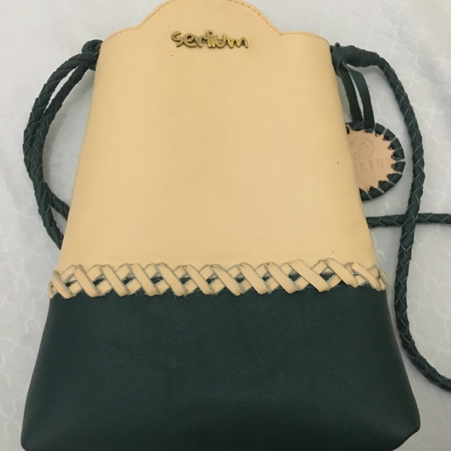 Serlium leather sling bag