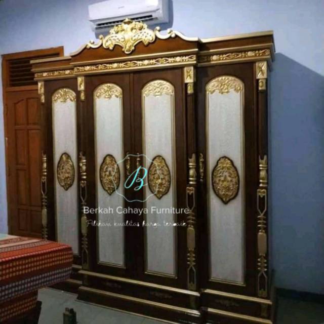 Lemari pakaian 4 pintu kayu jati ukir jepara