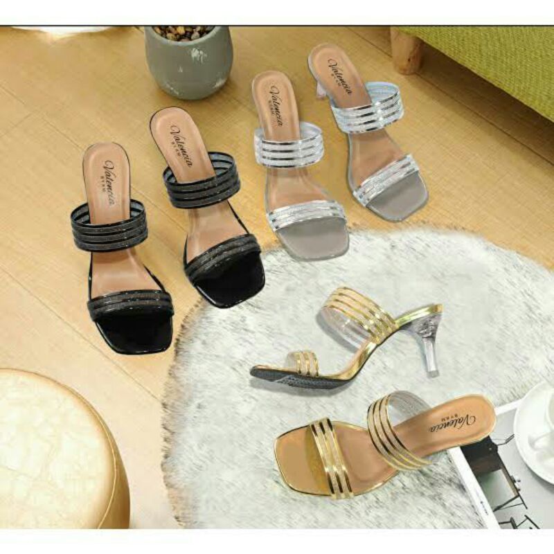 High heels wanita, hak kaca