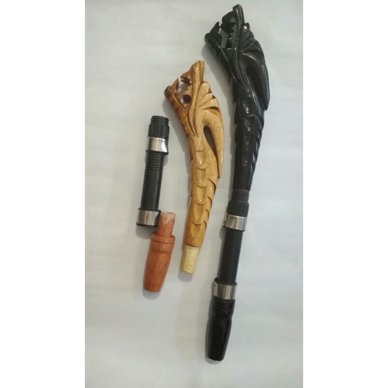 pahul ukir reel kayu naga