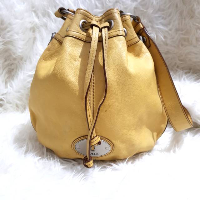 TAS FOSSIL VINTAGE MADDOX DRAWSTRING YELLOW PRELOVED