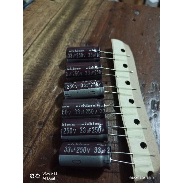 Kapasitor Elco 33uf-250volt Capasitor 33 250v 33uf 250 volt  33 250volt 33uf 250v 33uf 250v Ori