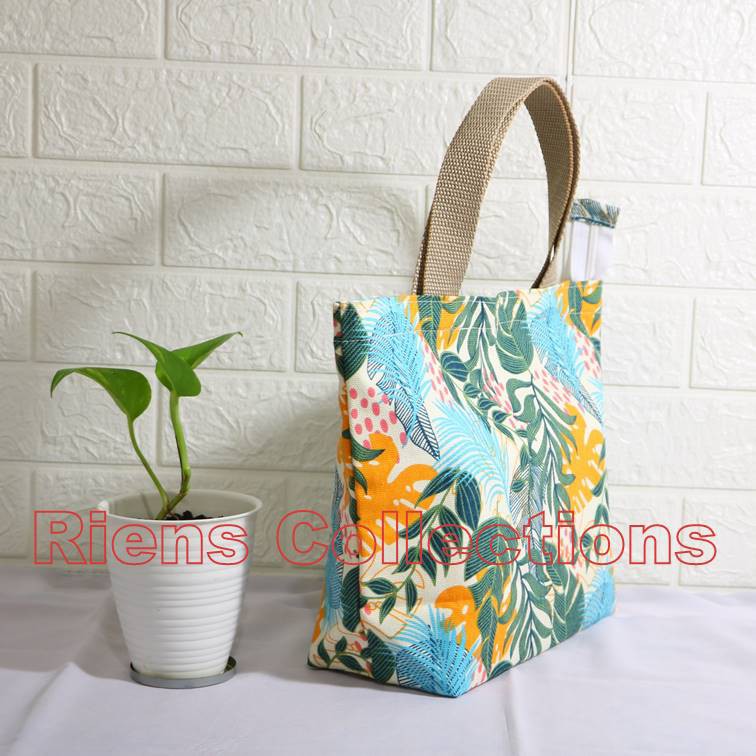 RIENS COLLECTIONS. HANDBAG BESAR BAHAN KANVAS MOTIF FLORAL KUNING